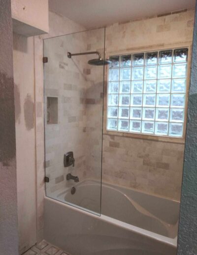 Bathtub With Stationary Glass Panel