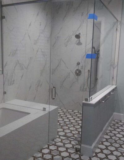 Shower With Framed Shower Door &Amp; Glass Panel